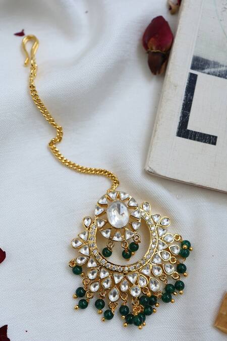 Paisley Pop Green Half Crescent Carved Maangtikka at Aza Fashions Paisley Pop_Green Half Crescent Carved Maangtikka _at_Aza_Fashions