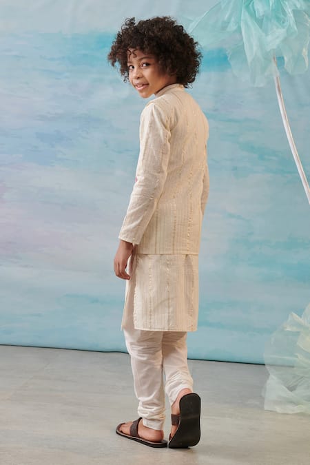 Shop Cute Couture Beige Cotton, Silk, Lurex Embroidery Floral Applique Bundi And Churidar Set at Aza Fashions Shop_Cute Couture_Beige Cotton, Silk, Lurex Embroidery Floral Applique Bundi And Churidar Set _at_Aza_Fashions