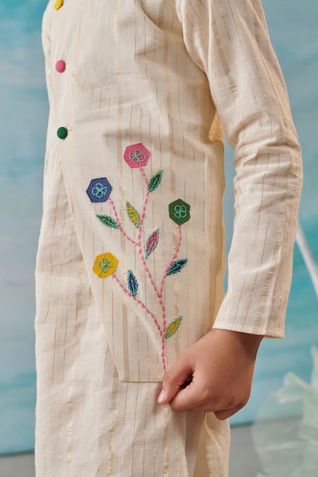 Shop Cute Couture Beige Cotton, Silk, Lurex Embroidery Floral Applique Bundi And Churidar Set Online at Aza Fashions Shop_Cute Couture_Beige Cotton, Silk, Lurex Embroidery Floral Applique Bundi And Churidar Set _Online_at_Aza_Fashions