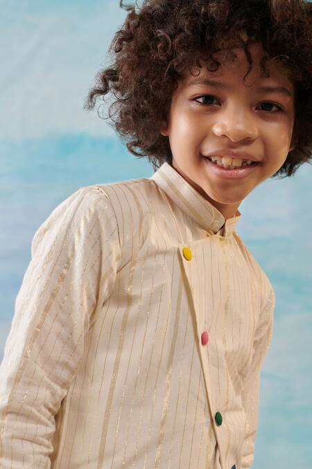 Cute Couture Beige Cotton, Silk, Lurex Embroidery Floral Applique Bundi And Churidar Set at Aza Fashions Cute Couture_Beige Cotton, Silk, Lurex Embroidery Floral Applique Bundi And Churidar Set _at_Aza_Fashions