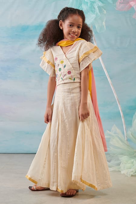 Cute Couture Beige , Silk, Lurex, Satin, Floral Ruffle Blouse And Lehenga Set Online at Aza Fashions Cute Couture_Beige , Silk, Lurex, Satin, Floral Ruffle Blouse And Lehenga Set _Online_at_Aza_Fashions