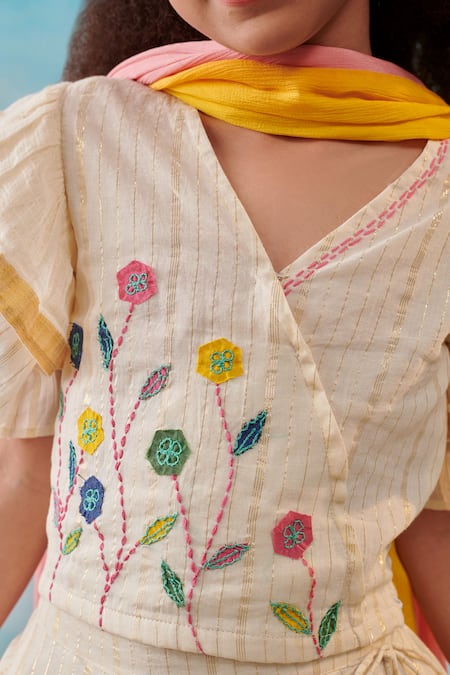 Shop Cute Couture Beige , Silk, Lurex, Satin, Floral Ruffle Blouse And Lehenga Set Online at Aza Fashions Shop_Cute Couture_Beige , Silk, Lurex, Satin, Floral Ruffle Blouse And Lehenga Set _Online_at_Aza_Fashions