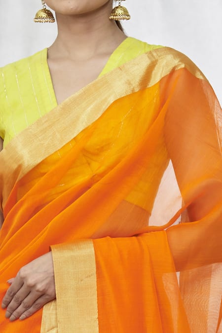 Mint N Oranges_Orange Chanderi Chevron Pallu Saree With Unstitched Blouse Fabric _at_Aza_Fashions