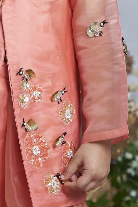 Shop Vivedkids Peach Tissue Embroidery, Sequins, Floral Garden Embellished Jacket With Sharara Online at Aza Fashions Shop_Vivedkids_Peach Tissue Embroidery, Sequins, Floral Garden Embellished Jacket With Sharara _Online_at_Aza_Fashions