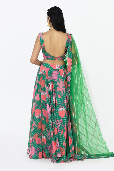 Shop Rishi and Vibhuti Green Crepe, Net Mirrors, Tassels Scoop Neck Jade Floral Print Lehenga Set at Aza Fashions Shop_Rishi and Vibhuti_Green Crepe, Net Mirrors, Tassels Scoop Neck Jade Floral Print Lehenga Set _at_Aza_Fashions