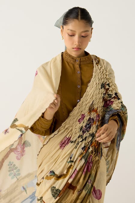 Buy Cord Ivory Cotton Embroidery Safari Print Smocked Saree Buy_Cord_Ivory Cotton Embroidery Safari Print Smocked Saree