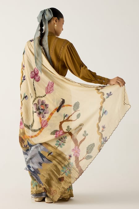 Shop Cord Ivory Cotton Lace Bandeau Neck Safari Print Smocked Saree With Top at Aza Fashions Shop_Cord_Ivory Cotton Lace Bandeau Neck Safari Print Smocked Saree With Top_at_Aza_Fashions