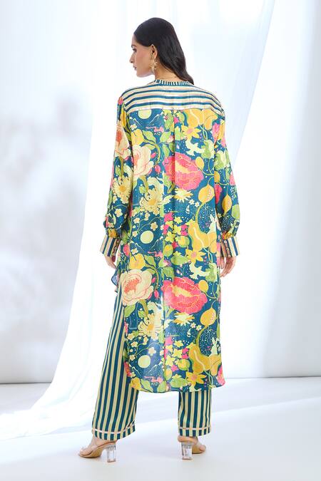 Shop Gopi Vaid Blue Satin Collared Floral Print Asymmetric Tunic And Pant Set at Aza Fashions Shop_Gopi Vaid_Blue Satin Collared Floral Print Asymmetric Tunic And Pant Set_at_Aza_Fashions