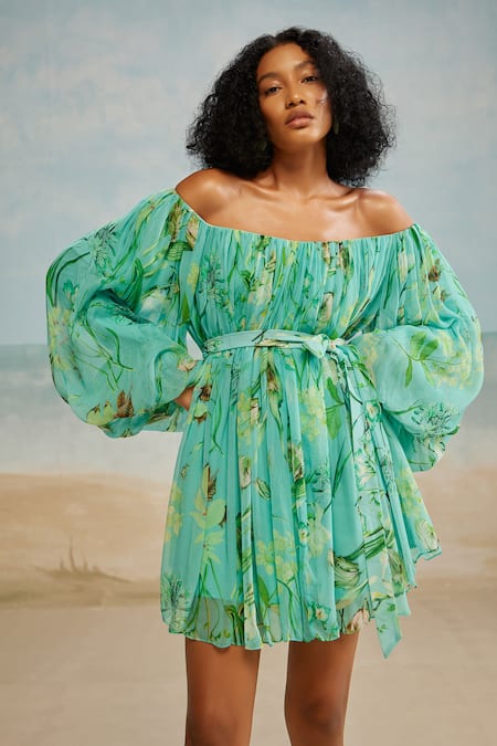 The Iaso Green Chiffon, Modal Off-shoulder Mele Off Dress With Belt at Aza Fashions The Iaso_Green Chiffon, Modal Off-shoulder Mele Off Dress With Belt _at_Aza_Fashions