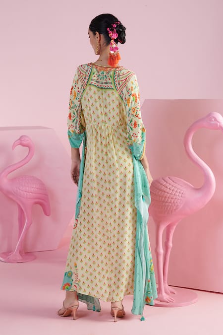 Shop Mandira Wirk - Indian Ivory Crepe Sequins, Beads Plunge Neck Seyda Iznik Print Kaftan at Aza Fashions Shop_Mandira Wirk - Indian_Ivory Crepe Sequins, Beads Plunge Neck Seyda Iznik Print Kaftan _at_Aza_Fashions