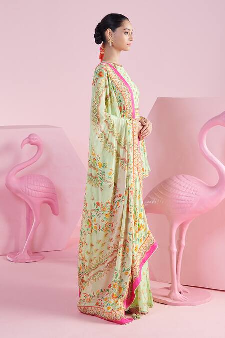 Shop Mandira Wirk - Indian Green Chanderi, Chiffon Sequins, Nevin Floral Print Peplum Top Flared Pant Set Online at Aza Fashions Shop_Mandira Wirk - Indian_Green Chanderi, Chiffon Sequins, Nevin Floral Print Peplum Top Flared Pant Set _Online_at_Aza_Fashions