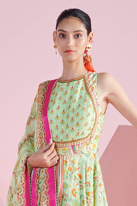 Mandira Wirk - Indian Green Chanderi, Chiffon Sequins, Nevin Floral Print Peplum Top Flared Pant Set at Aza Fashions Mandira Wirk - Indian_Green Chanderi, Chiffon Sequins, Nevin Floral Print Peplum Top Flared Pant Set _at_Aza_Fashions