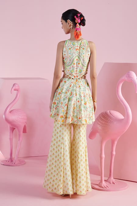 Shop Mandira Wirk - Indian Ivory Chanderi Sequins, Beads, Embroidery Imaya Printed Peplum Top Sharara Set at Aza Fashions Shop_Mandira Wirk - Indian_Ivory Chanderi Sequins, Beads, Embroidery Imaya Printed Peplum Top Sharara Set _at_Aza_Fashions