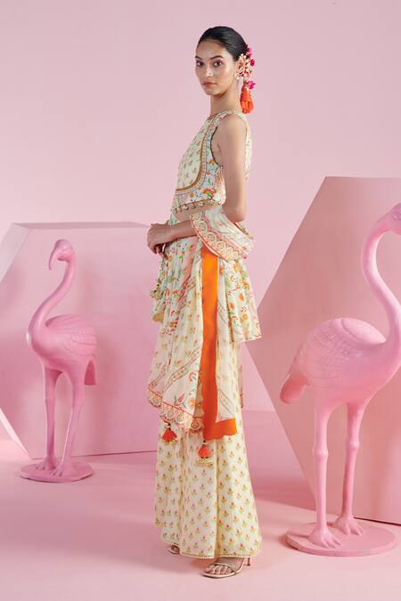 Mandira Wirk - Indian Ivory Chanderi Sequins, Beads, Embroidery Imaya Printed Peplum Top Sharara Set at Aza Fashions Mandira Wirk - Indian_Ivory Chanderi Sequins, Beads, Embroidery Imaya Printed Peplum Top Sharara Set _at_Aza_Fashions