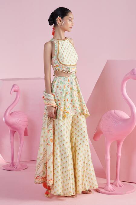 Buy Mandira Wirk - Indian Ivory Chanderi Sequins, Beads, Embroidery Imaya Printed Peplum Top Sharara Set Buy_Mandira Wirk - Indian_Ivory Chanderi Sequins, Beads, Embroidery Imaya Printed Peplum Top Sharara Set