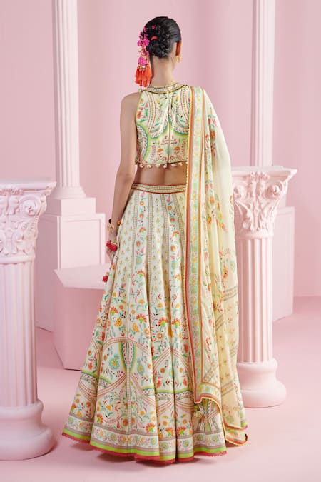 Shop Mandira Wirk - Indian Ivory Chanderi Sequins, Beads Halter Neck Safir Blossom Print Lehenga Set at Aza Fashions Shop_Mandira Wirk - Indian_Ivory Chanderi Sequins, Beads Halter Neck Safir Blossom Print Lehenga Set _at_Aza_Fashions