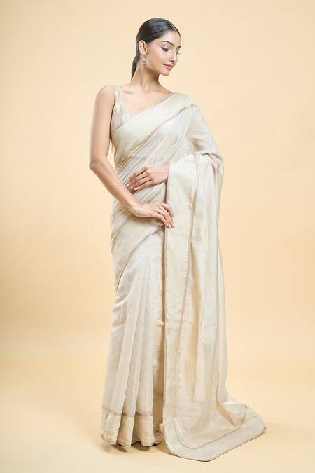 Samyukta Singhania_Beige Tissue Sequins Border Embroidered Saree_Online_at_Aza_Fashions