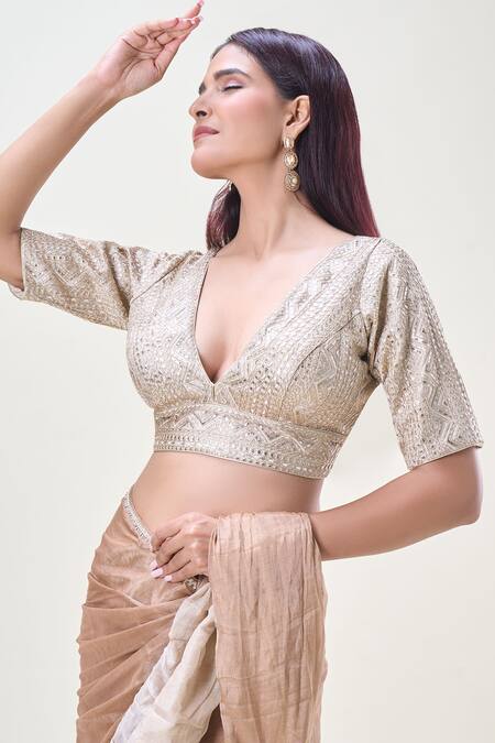 Samyukta Singhania Beige Silk Gota Patti, Zari Plunge Neck Embellished Saree Blouse at Aza Fashions Samyukta Singhania_Beige Silk Gota Patti, Zari Plunge Neck Embellished Saree Blouse_at_Aza_Fashions