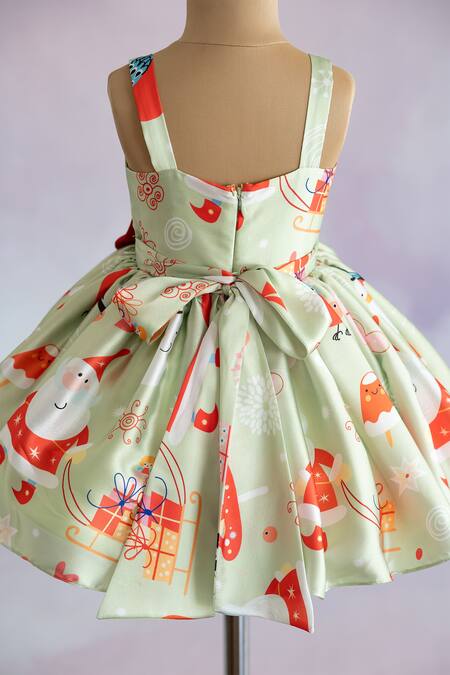 Ruchika Lath Label Green Satin, Crepe Bows Christmas Theme Print Dress Online at Aza Fashions Ruchika Lath Label_Green Satin, Crepe Bows Christmas Theme Print Dress _Online_at_Aza_Fashions