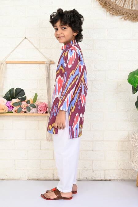 Shop THE COTTON STAPLE Magenta Cotton Embroidery Rouge Paisley Ikat Print Kurta And Pant Set Online at Aza Fashions Shop_THE COTTON STAPLE_Magenta Cotton Embroidery Rouge Paisley Ikat Print Kurta And Pant Set _Online_at_Aza_Fashions