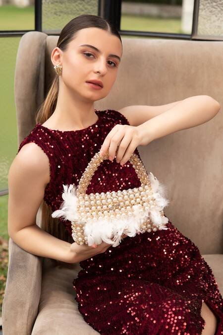 Shop Modarta White Pearls, Feathers, Beads Handbag With at Aza Fashions Shop_Modarta_White Pearls, Feathers, Beads Handbag With _at_Aza_Fashions