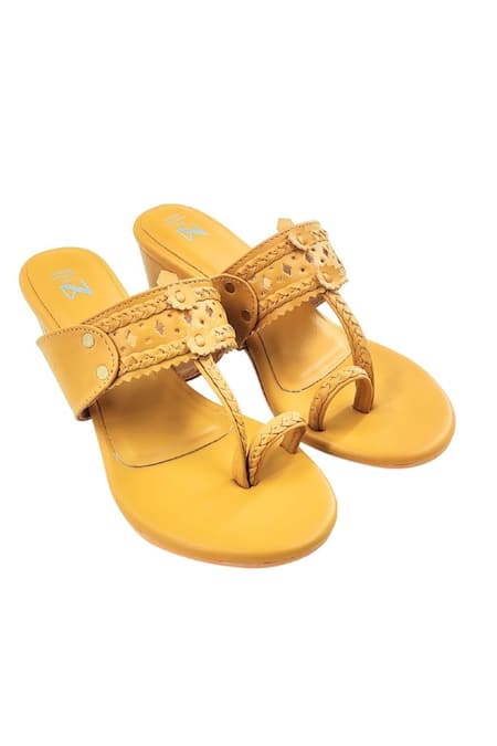 Shop The Madras Trunk Yellow Cutwork Braided Strap Kolhapuri Heels at Aza Fashions Shop_The Madras Trunk_Yellow Cutwork Braided Strap Kolhapuri Heels _at_Aza_Fashions