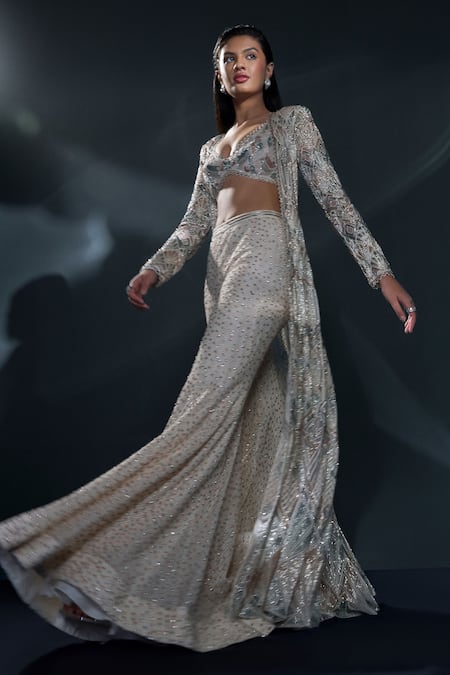 Ritika Mirchandani Ivory Crepe Embroidered Crystal Sweetheart Althea Jacket Sharara Set at Aza Fashions Ritika Mirchandani_Ivory Crepe Embroidered Crystal Sweetheart Althea Jacket Sharara Set _at_Aza_Fashions