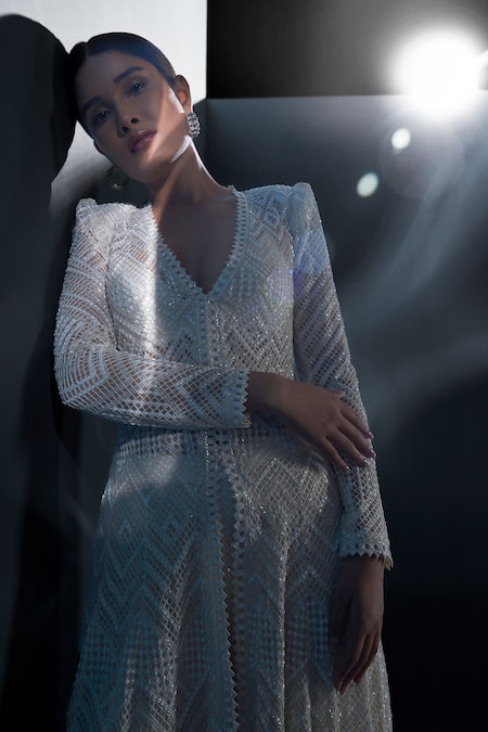 Ritika Mirchandani_Ivory Net, Crepe, Georgette Astris Cutwork Mesh High-low Jacket Sharara Set _Online_at_Aza_Fashions