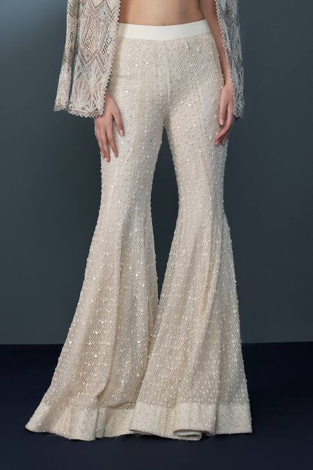 Ritika Mirchandani_Ivory Net, Crepe, Georgette Zenara Geometric Cutwork Blazer Sharara Set _Online_at_Aza_Fashions