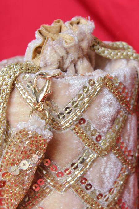 Feza Bags Beige Embroidery Trellis Circular Bag at Aza Fashions Feza Bags_Beige Embroidery Trellis Circular Bag _at_Aza_Fashions