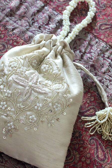 Feza Bags_Ivory Embroidery, Zari Flower Vine Potli Bag _at_Aza_Fashions