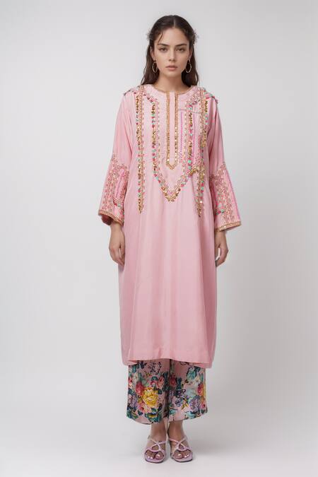 Shop Debyani + CO Pink Cotton Fringe, Embroidery Round Neck Kurta And Floral Print Pant Set Online at Aza Fashions Shop_Debyani + CO_Pink Cotton Fringe, Embroidery Round Neck Kurta And Floral Print Pant Set _Online_at_Aza_Fashions