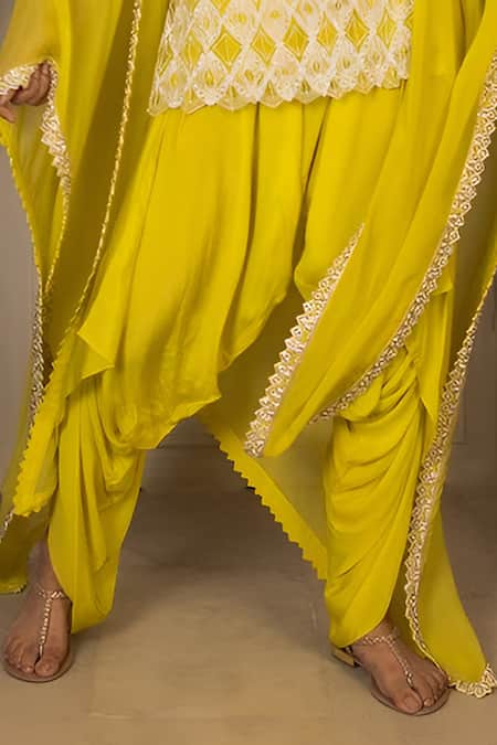 Ritika Mirchandani_Yellow Net, Crepe Sequins Scoop Neck Viktoriya Embellished Border Cape Kurta Set _Online_at_Aza_Fashions