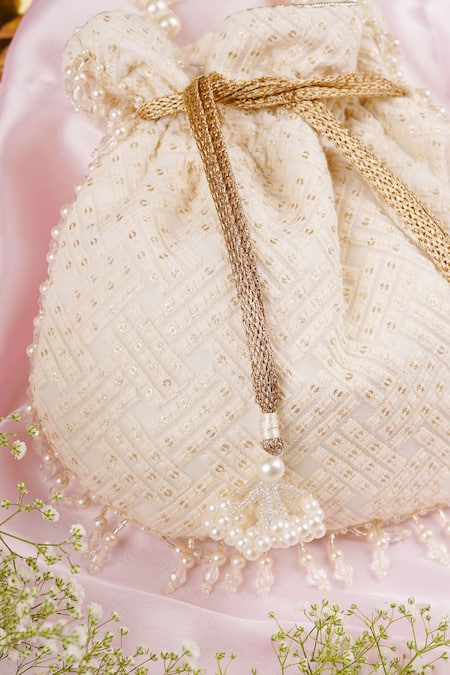 Shop_Swabhimann_White Embroidery, Beads Broken Stripe Potli _Online_at_Aza_Fashions