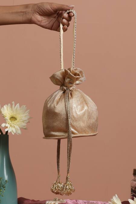 Shop Swabhimann Gold Pearls, Glitter Embellished Handle Metallic Potli at Aza Fashions Shop_Swabhimann_Gold Pearls, Glitter Embellished Handle Metallic Potli_at_Aza_Fashions