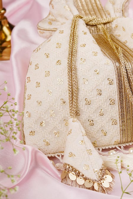 Shop_Swabhimann_White Pearls, Sequins Foliage Vine Embroidered Potli _Online_at_Aza_Fashions