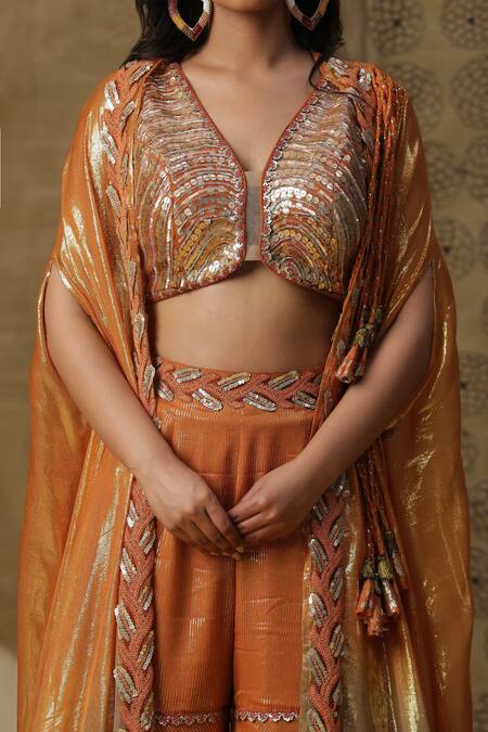 Arpita Sulakshana_Orange Georgette, Crepe Sequins V-neck Hand Embroidered Palazzo Set With Cape _at_Aza_Fashions
