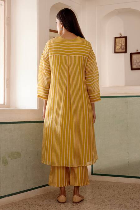 Shop Vaayu Yellow Cotton, Muslin Round Neck Linear Print Kurta And Pant Set at Aza Fashions Shop_Vaayu_Yellow Cotton, Muslin Round Neck Linear Print Kurta And Pant Set_at_Aza_Fashions