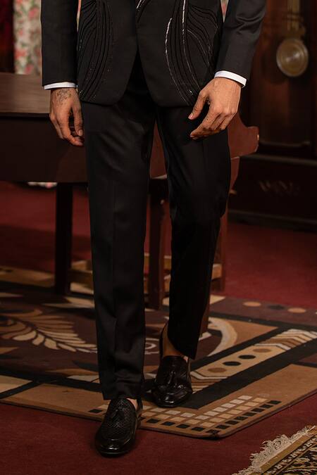 Design O Stitch Black Suede, Wool Cut Work Cutdana Hand Embroidered Tuxedo Jacket With Pant Online at Aza Fashions Design O Stitch_Black Suede, Wool Cut Work Cutdana Hand Embroidered Tuxedo Jacket With Pant _Online_at_Aza_Fashions
