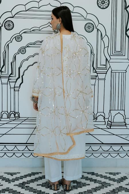 Shop Gulabo Jaipur White Cotton Embroidery, Sequins Split V-neck Marina Kurta Pant Set at Aza Fashions Shop_Gulabo Jaipur_White Cotton Embroidery, Sequins Split V-neck Marina Kurta Pant Set _at_Aza_Fashions