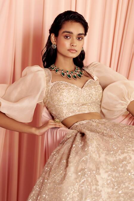 Shop Pankaj & Nidhi Beige Tulle, Silk Organza thea Encrusted Lehenga With Puff Sleeve Blouse Online at Aza Fashions Shop_Pankaj & Nidhi_Beige Tulle, Silk Organza thea Encrusted Lehenga With Puff Sleeve Blouse _Online_at_Aza_Fashions