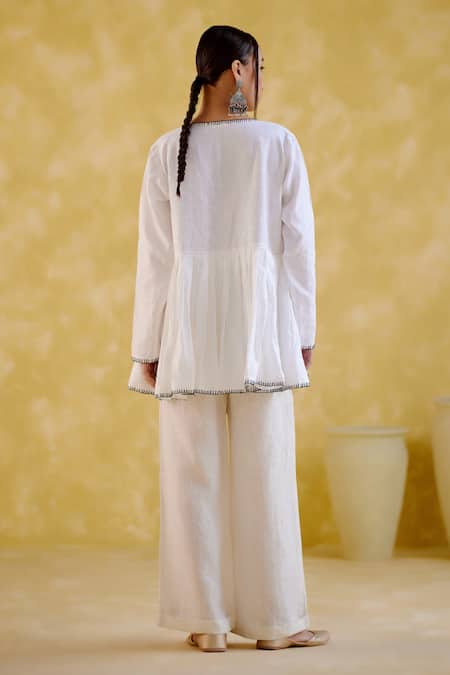 Shop_5elements_White Linen Tassels V-neck Moonlight Peplum Tunic With Pant _at_Aza_Fashions