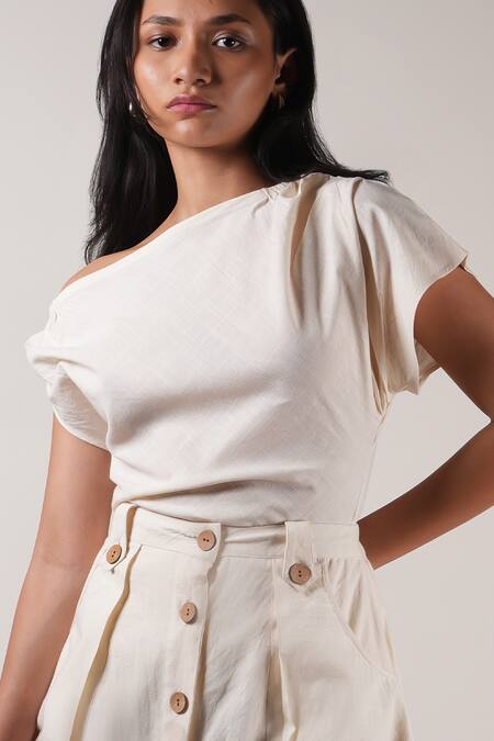 MATI_1 Off White Cotton Solid Button-down Skirt at Aza Fashions MATI_1_Off White Cotton Solid Button-down Skirt _at_Aza_Fashions