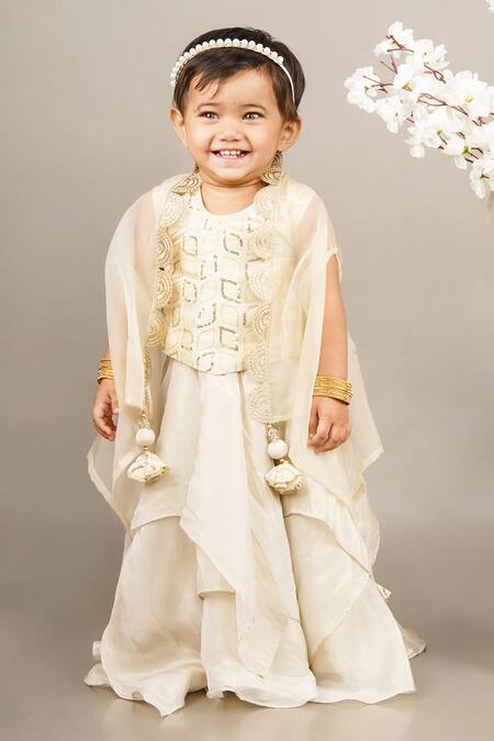 Shop Little Brats Beige Organza, Tissue Sequins, Tassels Embroidered Asymmetrical Lehenga Set Online at Aza Fashions Shop_Little Brats_Beige Organza, Tissue Sequins, Tassels Embroidered Asymmetrical Lehenga Set _Online_at_Aza_Fashions