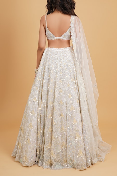 Shop Seema Gujral Ivory Net Sequins, Embroidery Sweetheart Neck Embellished Bridal Lehenga Set at Aza Fashions Shop_Seema Gujral_Ivory Net Sequins, Embroidery Sweetheart Neck Embellished Bridal Lehenga Set _at_Aza_Fashions