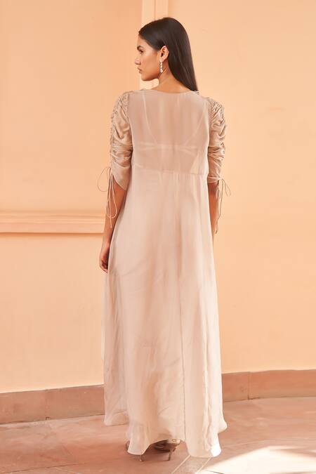 Shop Amrta By Guneet Kondal Beige Satin Beads Square Neck Hand Embroidered Blouse Set With Cape at Aza Fashions Shop_Amrta By Guneet Kondal_Beige Satin Beads Square Neck Hand Embroidered Blouse Set With Cape _at_Aza_Fashions