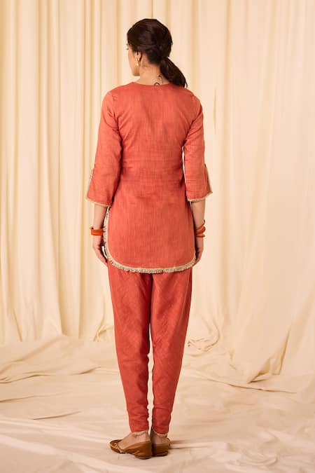 Shop Leela By A Peach Chanderi, Cotton Tassels, Lace Zari Embroidered Kurta Tulip Pant Set at Aza Fashions Shop_Leela By A_Peach Chanderi, Cotton Tassels, Lace Zari Embroidered Kurta Tulip Pant Set _at_Aza_Fashions