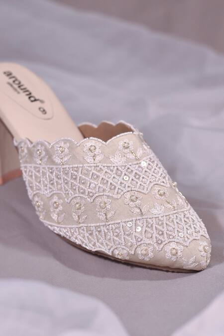 Around Always Ivory Cut Work, Embroidery Celeste Floral Cutwork Mule Heels Online at Aza Fashions Around Always_Ivory Cut Work, Embroidery Celeste Floral Cutwork Mule Heels _Online_at_Aza_Fashions