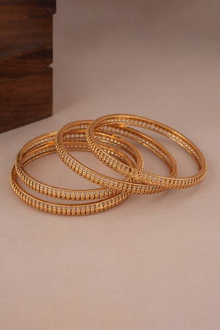 Buy Smars Jewelry Gold Plated Cut Work Carved Jaali Bangles-Set of 4 Online at Aza Fashions Buy_Smars Jewelry_Gold Plated Cut Work Carved Jaali Bangles-Set of 4_Online_at_Aza_Fashions