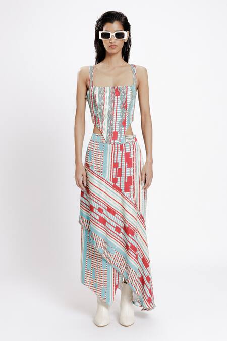 Doh Tak Keh Red Bemberg Twill Satin Print Local Asymmetrical Skirt Online at Aza Fashions Doh Tak Keh_Red Bemberg Twill Satin Print Local Asymmetrical Skirt_Online_at_Aza_Fashions